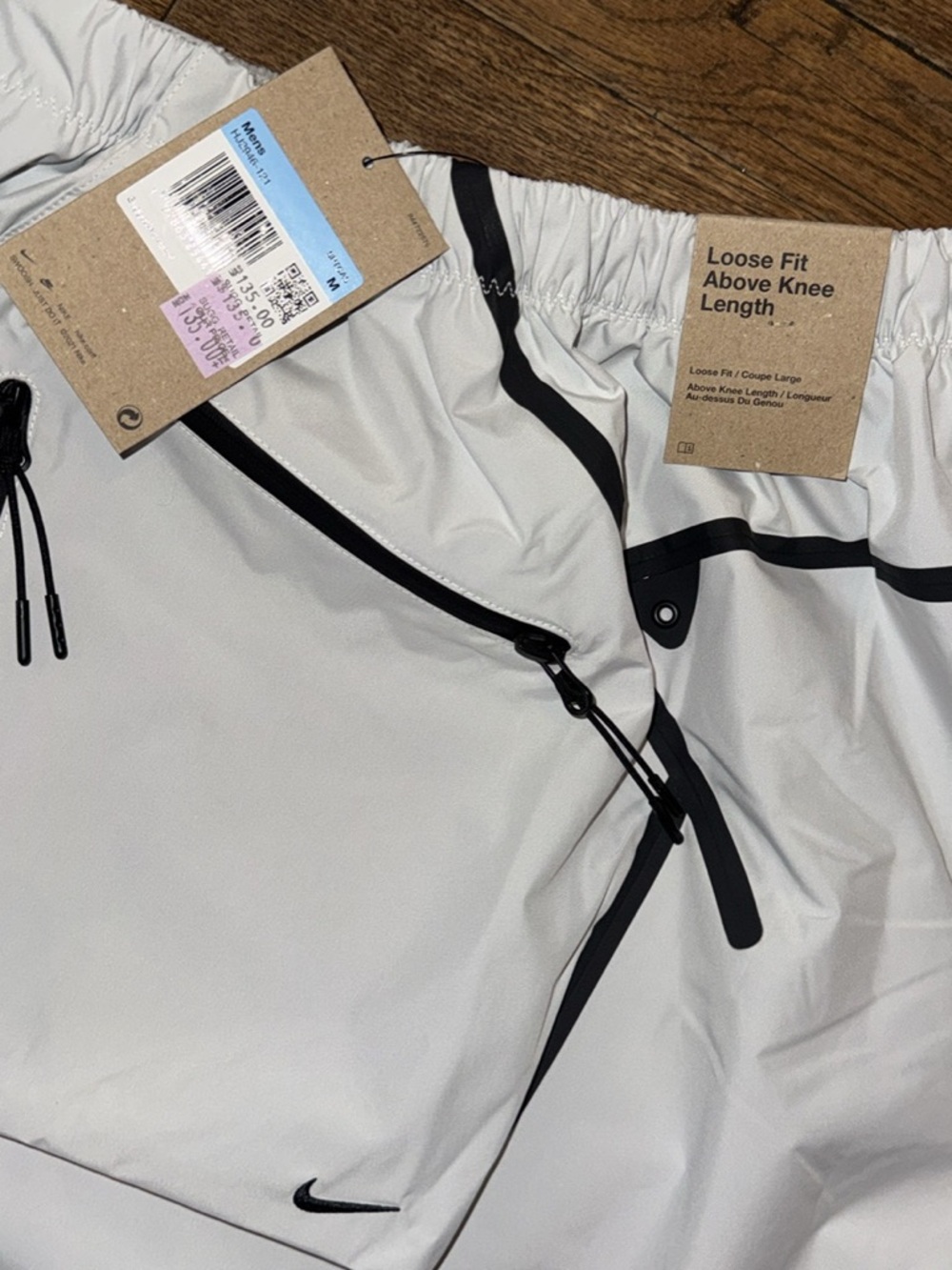 Nike White Athletic Shorts with Black Zipper Accents - Picture 6 of 6